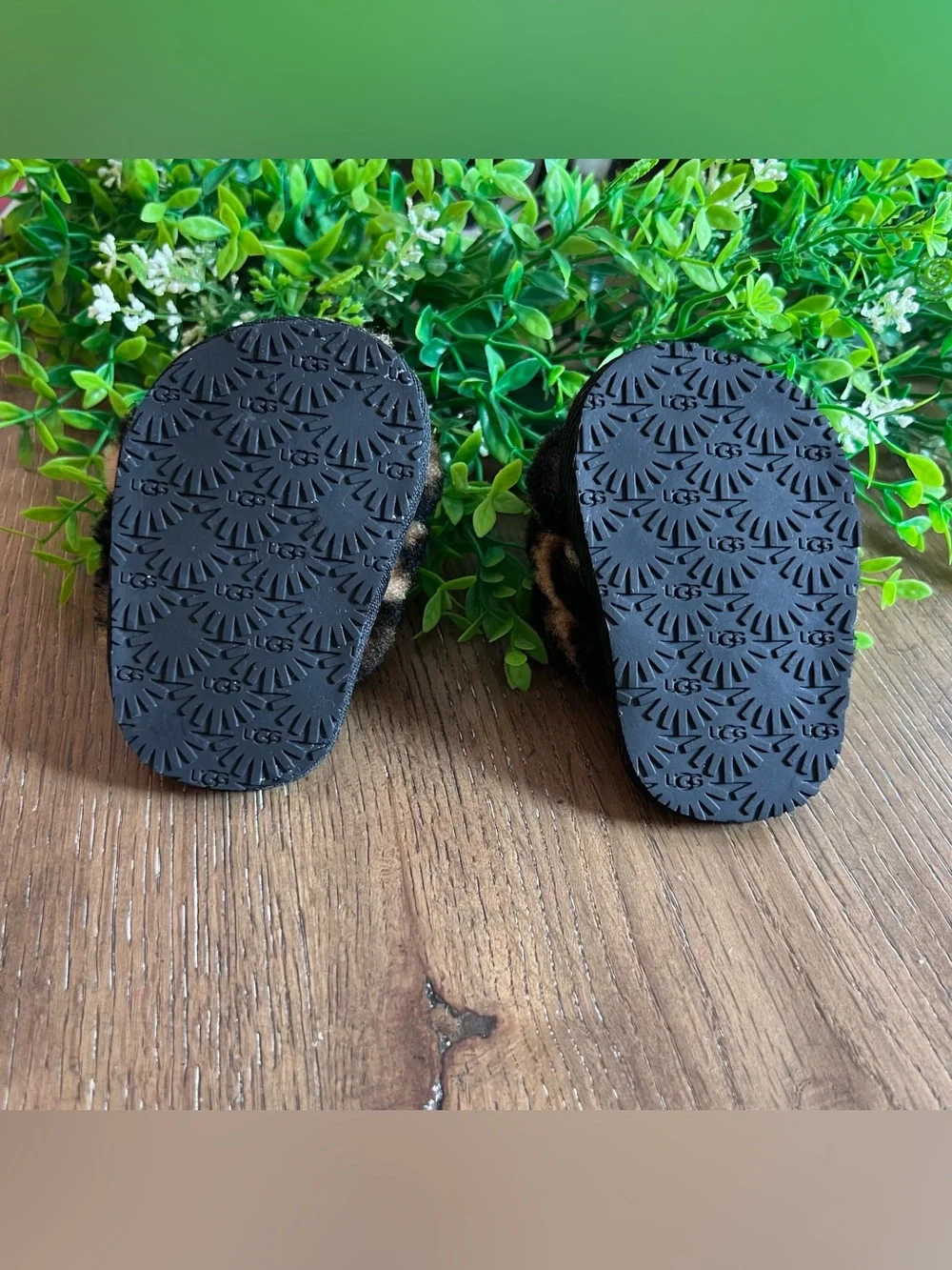 UGG Leopard Print Fuzzy Baby Slippers in Brown and Black